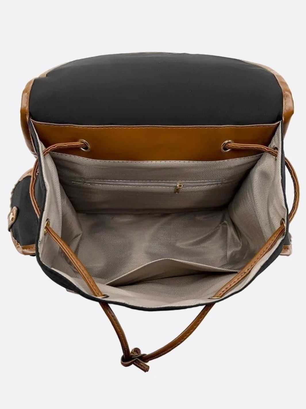 Mochila de lona y piel.
